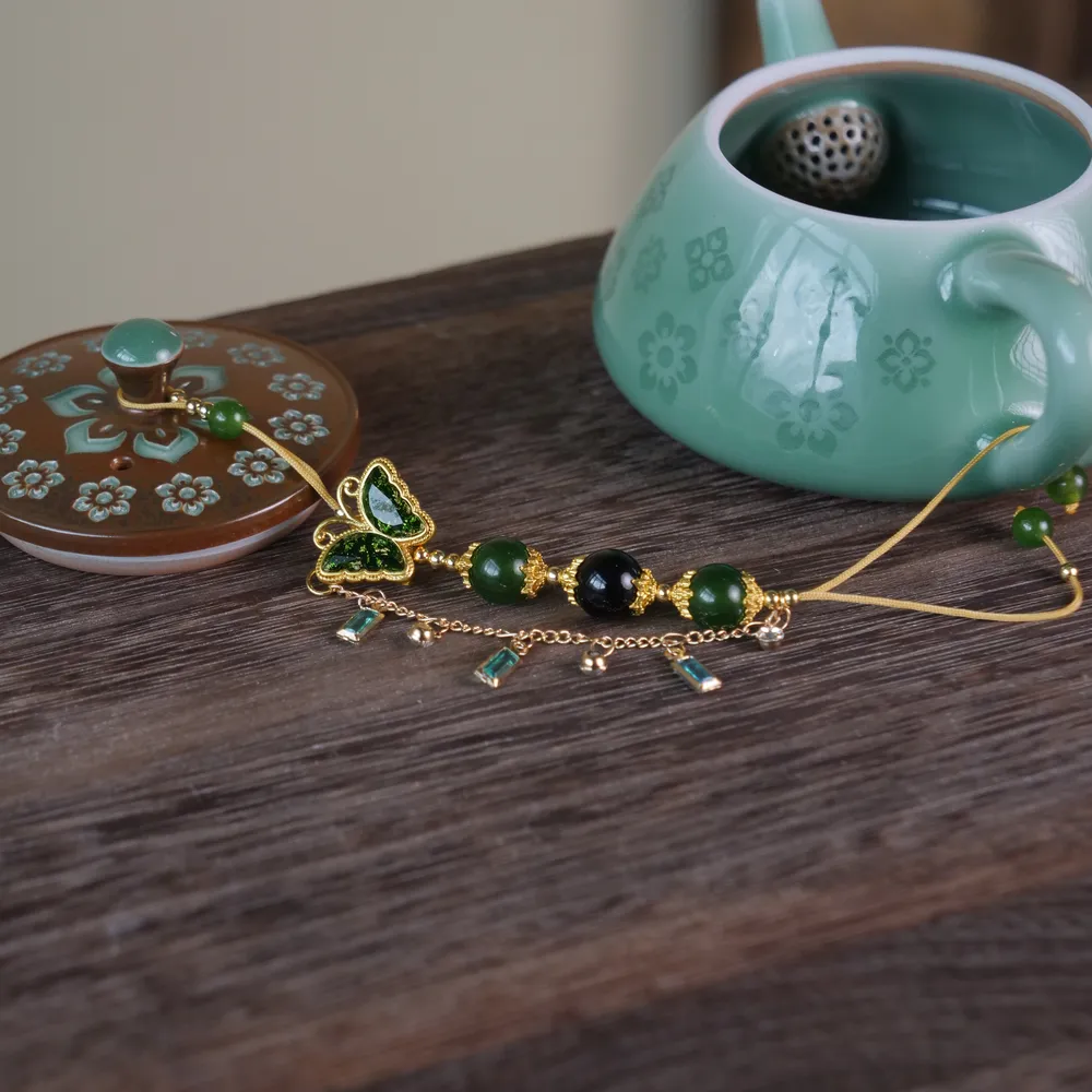 龙泉青瓷宝相花茶壶的壶绳
